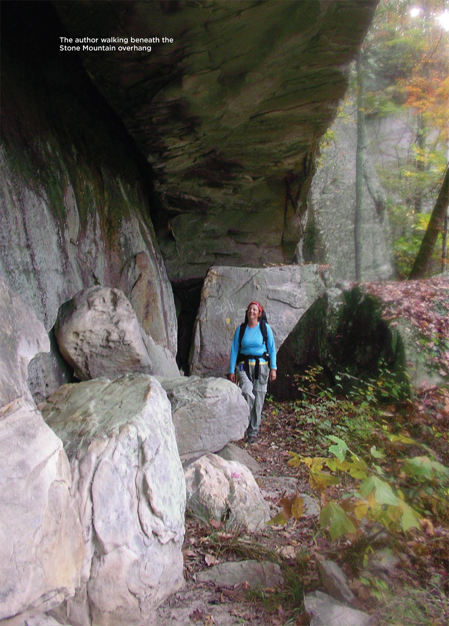 The author walking beneath the Stone Mountain overhang