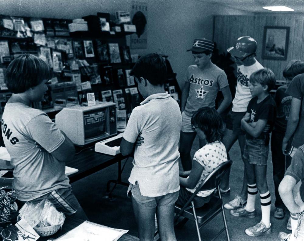 Local students at Bob West Computers in Brevard, NC, take turns with a Commodore computer. Courtesy of Bob West. ©1982, Bob West.