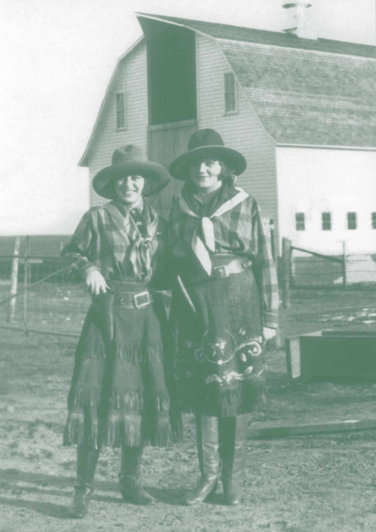 Photo of two cowgirls.