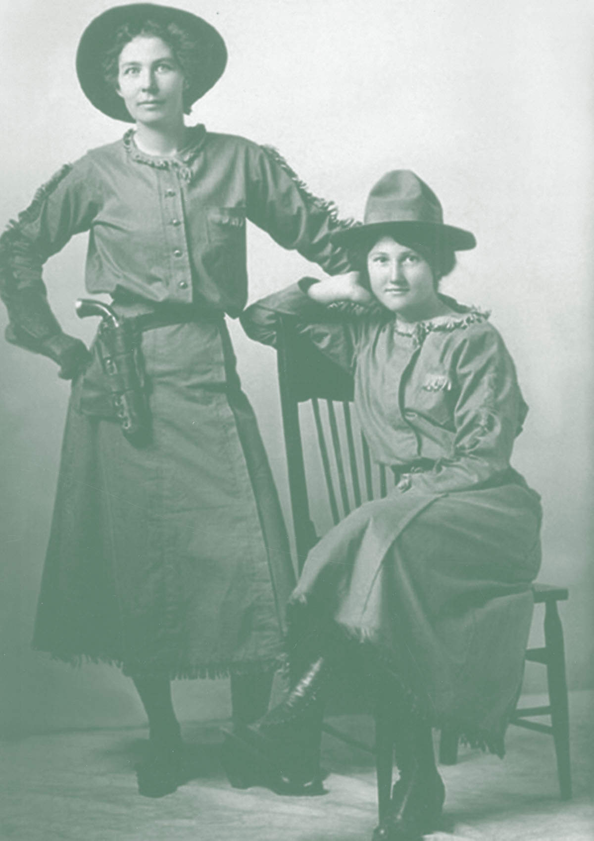 Photo of two cattle women.