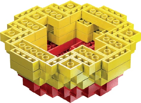 Step 8. Before you start the second half of the model, turn the top half over so that the tubes are facing up.