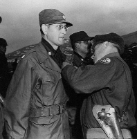 General Almond Awarding Legion of Merit, Korea 1950.tif