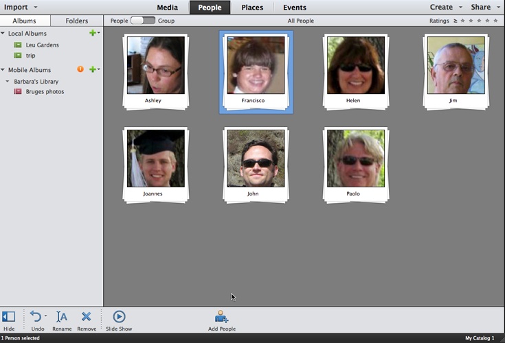 When you’re finished tagging the people in your photos, switch over to the Organizer’s People view to see all your photos of people in neat stacks for each person. To switch to this view, simply click the People tab at the top of the Organizer window.