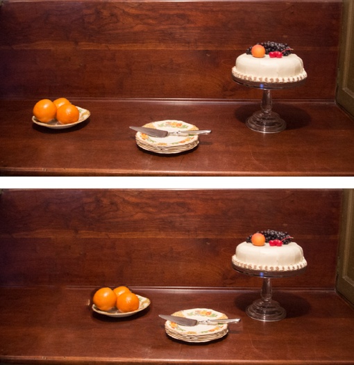 Top: Let’s say you need to use the dessert on this sideboard as an illustration. This photo is OK, but everything is pretty spread out.Bottom: With the help of the Content-Aware Move tool, you can bring the oranges and plates much closer to the cake.As you can see, this tool did a pretty good job, but the area to the left of the oranges still needs a bit of cleanup help. Moving the tool’s Healing slider to the left may help get rid of this problem spot. (Do this while your Content-Aware Move tool selection is still active.) If that doesn’t work, try the Clone Stamp (page 318).