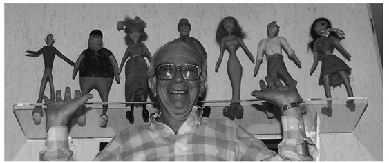 Sherwood Schwartz and hand-carved cast. Photo: Dawn Wells Archives