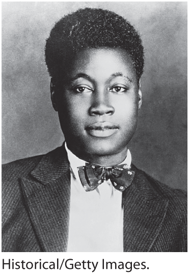 A photo of young Claude McKay, clad in a suit and bowtie.