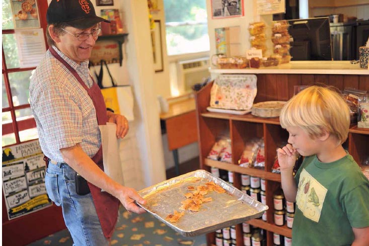 Sharing samples at a retail store selling both baked goods and canned products. JOHN D. IVANKO