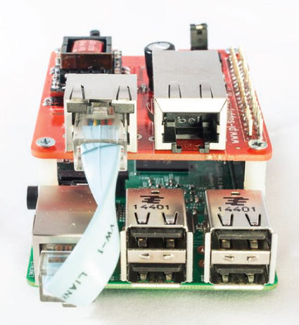 Photo showing Raspberry Pi with a PoE HAT.