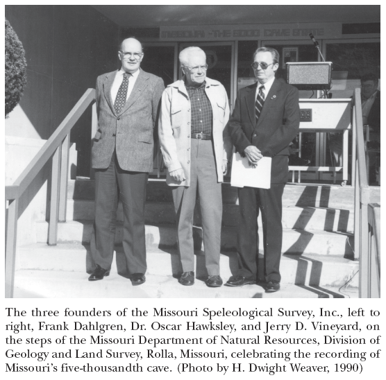 Image: The three founders of the Missouri Speleological Survey, Inc., left to right, Frank Dahlgren, Dr. Oscar Hawksley, and Jerry D. Vineyard, on the steps of the Missouri Department of Natural Resources, Division of Geology and Land Survey, Rolla, Missouri, celebrating the recording of Missouri’s five-thousandth cave. (Photo by H. Dwight Weaver, 1990)