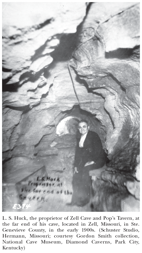 Image: L. S. Huck, the proprietor of Zell Cave and Pop’s Tavern, at the far end of his cave, located in Zell, Missouri, in Ste. Genevieve County, in the early 1900s. (Schuster Studio, Hermann, Missouri; courtesy Gordon Smith collection, National Cave Museum, Diamond Caverns, Park City, Kentucky)