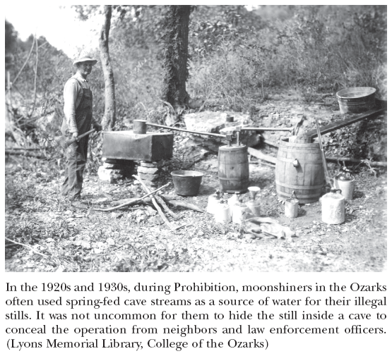 Image: In the 1920s and 1930s, during Prohibition, moonshiners in the Ozarks often used spring-fed cave streams as a source of water for their illegal stills. It was not uncommon for them to hide the still inside a cave to conceal the operation from neighbors and law enforcement officers. (Lyons Memorial Library, College of the Ozarks)