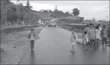 Within days of the 2004 tsunami, John Cauthen and a squadron of rotary-wing aircraft brought massive quantities of supplies to the needy citizens of Indonesia. (Courtesy John Cauthen)