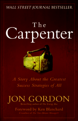 A cover page from the Wall street journal bestseller, Jon Gordon's “The Carpenter.” This book depicts a wooden structure with a tag line “A story about the greatest success strategies of all.” The book is foreword by Ken Blanchard