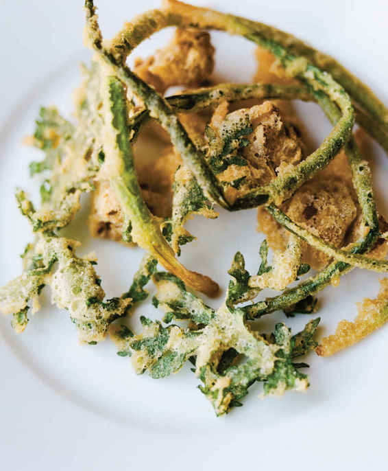 fried hen-of-the-woods mushrooms, scallions, and herbs with yogurt and green garlic