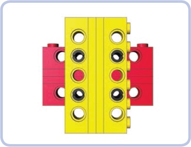 The brick-two plates-brick combination makes sure the spacing between bricks allows vertical connection. The addition of plates keeps the pin holes in the bricks exactly 1 stud apart.