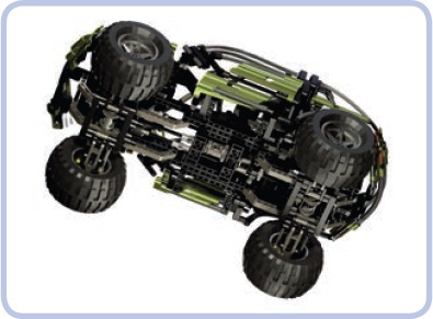 The 8466 4×4 Off-Roader set features another large car model, but this time only the center of the chassis remains studfull. This center provides the rigidity needed by the car’s impressive suspension system, but the set itself is mainly studless.