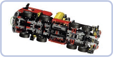 The 8285 Crane Truck set is an outstanding achievement in creating a rigid, sturdy studless chassis for a heavy vehicle. Studfull pieces are still there—note the clever use of a Technic brick to attach the license plate under the front bumper.