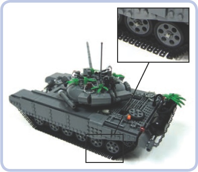 A model tank using wedge belt wheels with tires, suspended on torsion bars