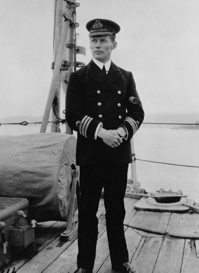 Photograph of captain Walter Hose, standing on the main deck of a ship.