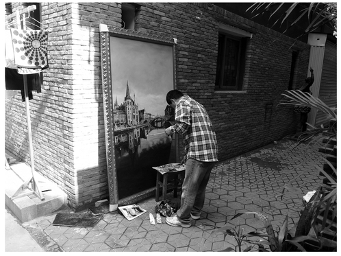 Figure 15.4 A painter at work (photo by Jeroen de Kloet)