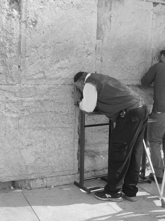 Man praying at the Western Wall