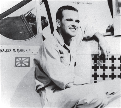 Col. Walker M. “Bud” Mahurin poses with his suitably decorated fighter showing the twenty-one kills he had amassed in Europe and the one Japanese victory he obtained with the Air Commandos. (U.S. Army Air Forces archives)