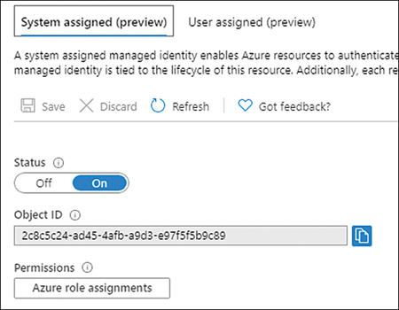 This is a screenshot of the Managed Identity panel. There are two tabs, one for System Assigned and another for User Assigned Managed Identities. The System Assigned tab is selected. There is a switch control with the values Off and On that represent the status of the Managed Identities feature. The On value is selected. Below the switch control, there is a gray text box with a GUID string. This GUID string is the Object ID assigned to the resource. Below the Object ID text box, there is a button with the text Azure Role Assignments.