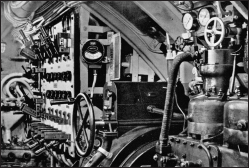 Engine room port side, looking aft, showing the port electric motor control panel. Author’s collection