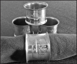 These silver-plated brass napkin rings, which are described in the catalog as “serviette rings,” are 1.25 inches long and have a 1.5-inch inside diameter. Author’s collection