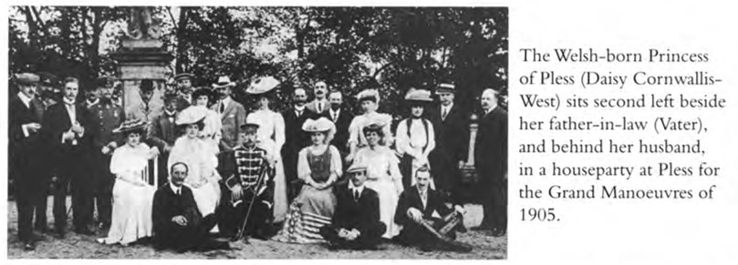 The Welsh-born Princess of Pless (Daisy Cornwallis-West) sits second left beside her father-in-law (Vater), and behind her husband, in a houseparty at Pless for the Grand Manoeuvres of 1905.