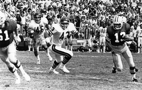 The 1980 season opener at Lambeau Field had a bizarre, happy ending for the home team as kicker Chester Marcol (13) returned his own blocked field goal kick 25 yards for a touchdown, giving the Packers a 12–6 victory. (courtesy of green bay press-gazette from tom pigeon collection)