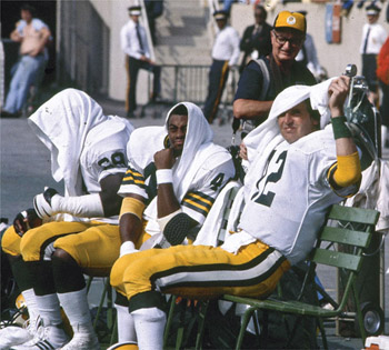 When Forrest Gregg decided to overhaul the Packers’ roster with younger talent, several veterans, including Eddie Lee Ivery (40) and Lynn Dickey (12), found themselves on the sidelines alongside longtime Packers photographer Vernon Biever. (wisconsin state journal)