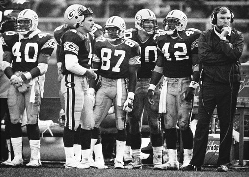 Forrest Gregg (far right) started looking elsewhere for answers as the Packers, including Eddie Lee Ivery (40), Ben Thomas (92), Chuck Fusina (4), Walter Stanley (87), Paul Ott Carruth (30), and Gary Ellerson (42), failed to make the playoffs in 1986. (milwaukee journal sentinel)