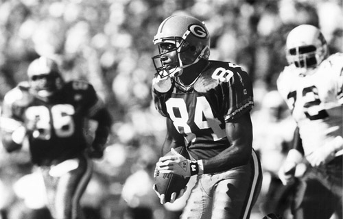 Wide receiver Sterling Sharpe (84) became an immediate impact player during his rookie season in 1988. By 1989 he was one of the NFL’s most feared offensive threats, catching ninety passes for 1,423 yards and twelve touchdowns. (from the green bay press-gazette archives, reprinted by permission)