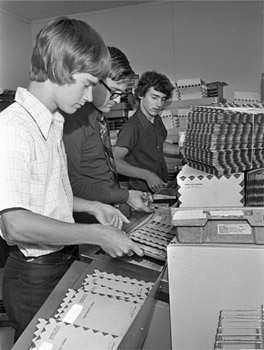 Although Lambeau Field had been sold out consistently since 1960, Bart Starr’s return brought added enthusiasm to season-ticket holders. Here (left to right) Kevin Kuehn, Jim Heintzkill, and Chuck Kuehn processed and mailed more than 50,000 sets of season tickets to 1975 Green Bay Packers games. (COURTESY OF THE PRESS-GAZETTE COLLECTION OF THE NEVILLE PUBLIC MUSEUM OF BROWN COUNTY)