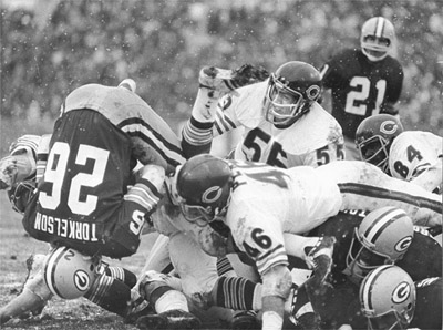 Running back Eric Torkelson (26) and the rest of the Packers found their 1975 season taking a nosedive as they lost eight of their first nine games. (wisconsin state journal)