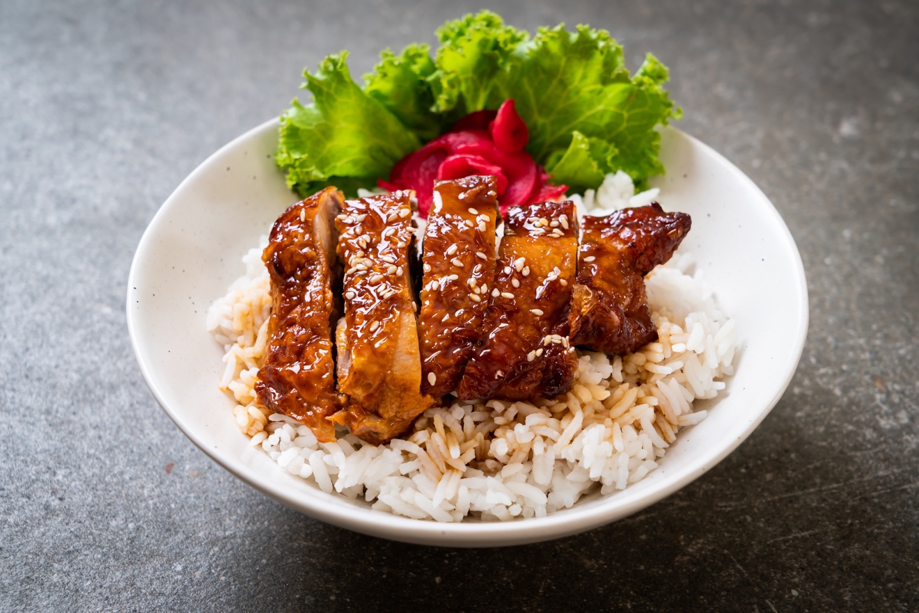 A plate of food with broccoli Description automatically generated