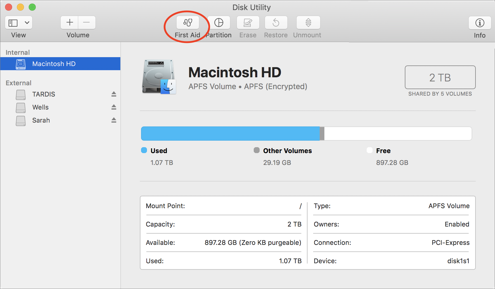 Figure 6: In Disk Utility, select a disk and then click First Aid (circled).