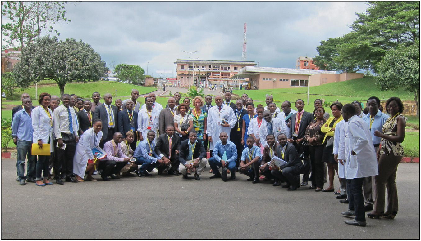 Outdoor group photo of African medical practitioners.