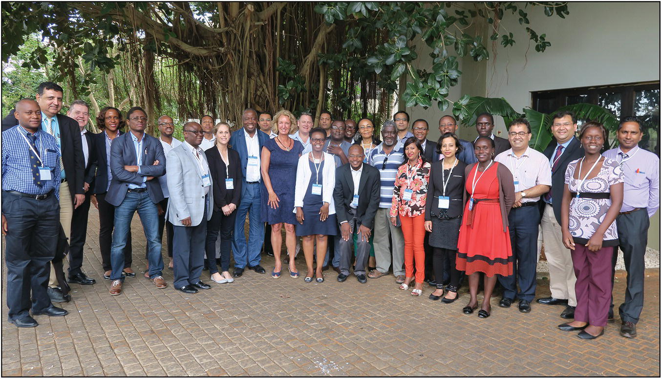 Group photo of African and Caucasian delegates.