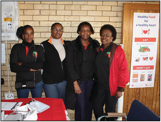 Group photo of four African women.