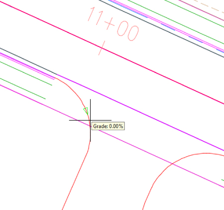 Wireframe diagram of a curb. It has a triangular glyph that appears on the segment. The triangular glyph is pointing toward the parking lot. A cursor indicating grade is below it.