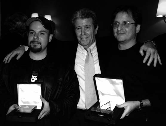 Con Martín Kohan, ganador del Premio Herralde, y Antonio Ortuño, finalista, en la fiesta en Barcelona