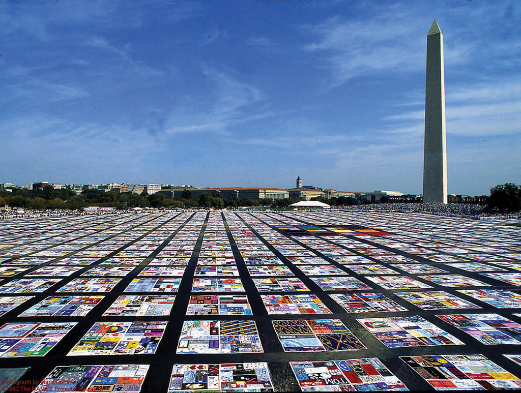 large quilt on national mall next to Washington Monument