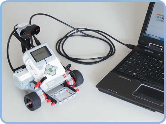 The robot connected to the computer using the set’s USB cable. Use the USB connection at the top of the EV3, as shown here.