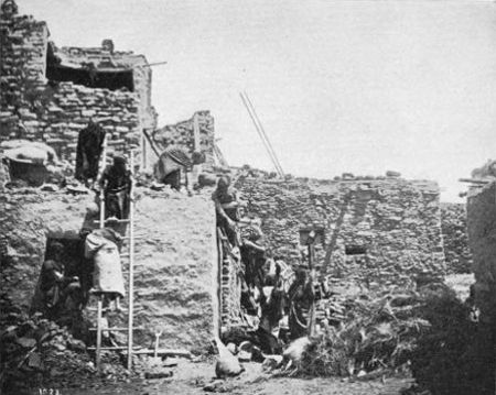 Hopi Women building a House at Oraibi.