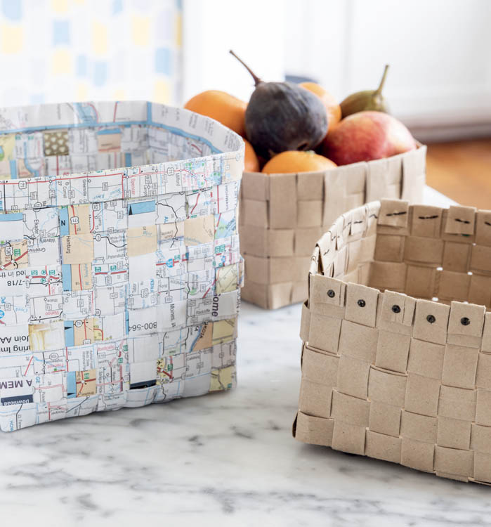 A collection of paper and ribbon baskets on a kitchen table