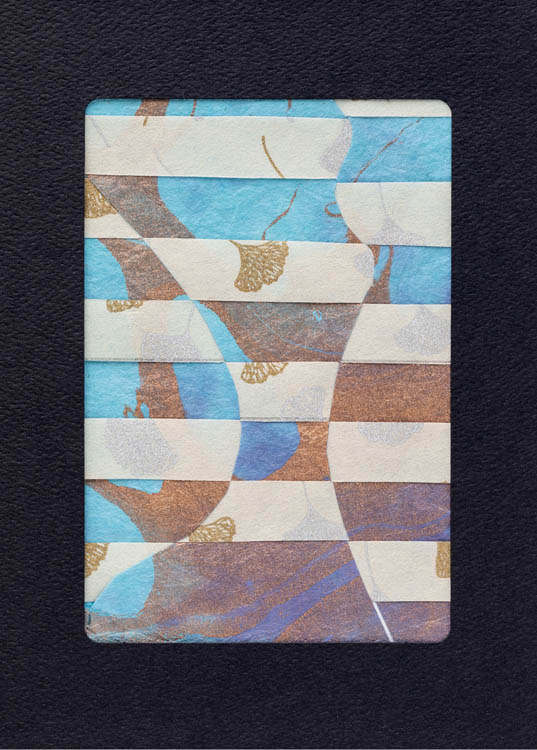 A paper woven greeting card with curves in the pattern