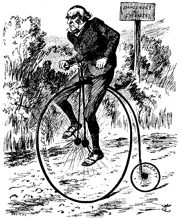 Man riding penny farthig bicycle.