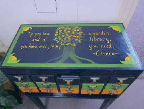 An old card catalog was painted for the seed cabinet.